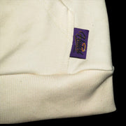 Our signature signature "Purple Label" signifying includance in our Halo'd Apparel "Purple Label Collection."